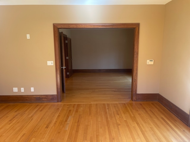 corridor featuring light hardwood / wood-style floors