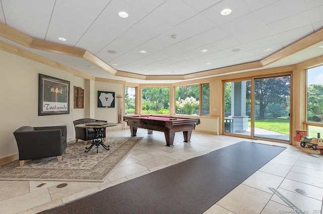 playroom featuring billiards, a tray ceiling, and light tile floors