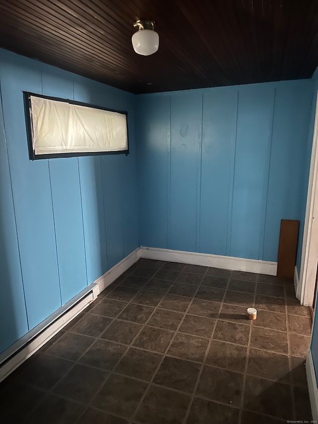 tiled empty room with wooden ceiling