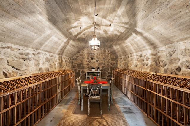 wine cellar featuring lofted ceiling