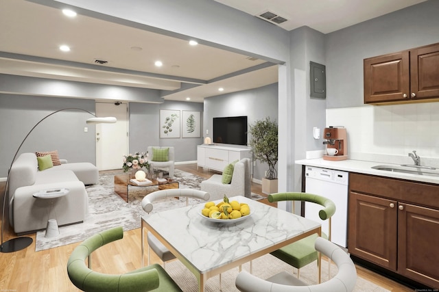 interior space featuring recessed lighting, light wood-type flooring, visible vents, and electric panel