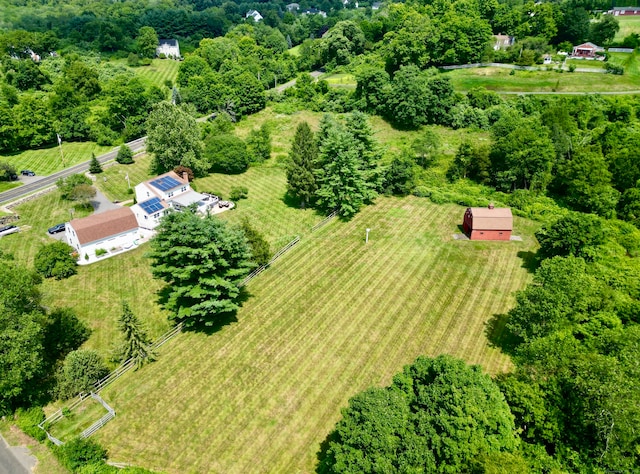 birds eye view of property featuring a rural view