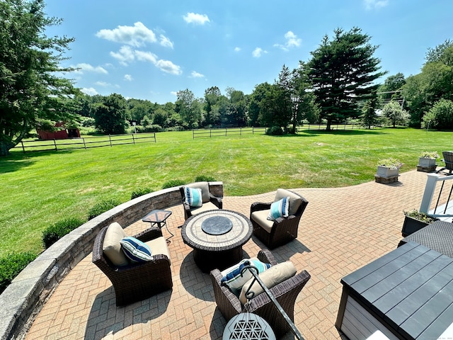 view of patio / terrace with a fire pit