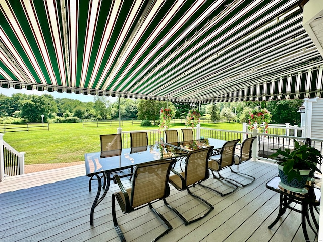 wooden terrace with a yard