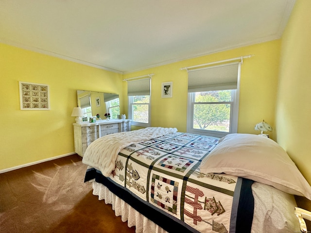 carpeted bedroom featuring crown molding