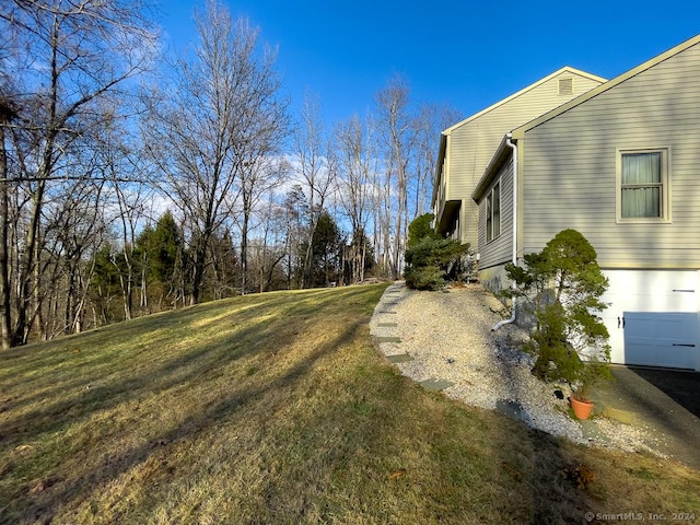 view of yard with a garage