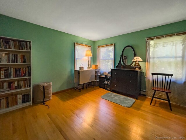 sitting room featuring hardwood / wood-style flooring