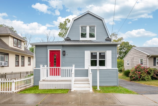 view of front of home with cooling unit