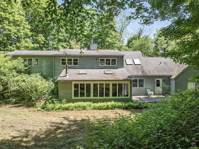 rear view of property with a patio