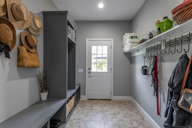 mudroom featuring light tile patterned floors