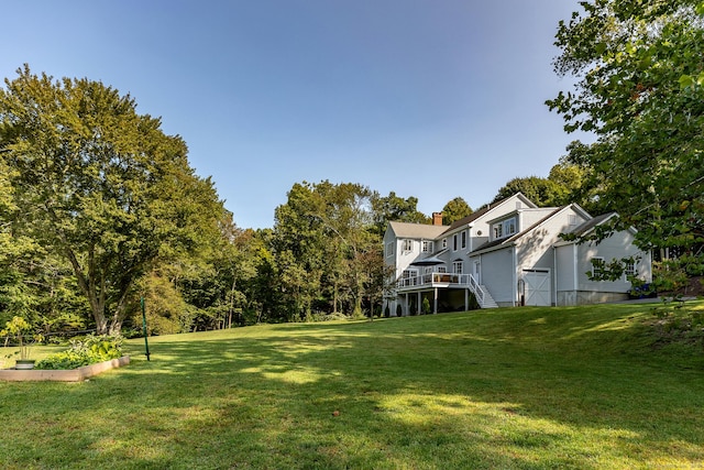 view of yard featuring a wooden deck