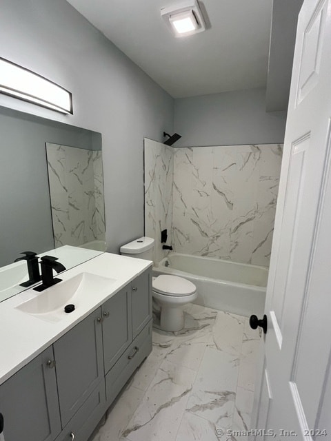 full bathroom featuring shower / washtub combination, tile flooring, toilet, and vanity