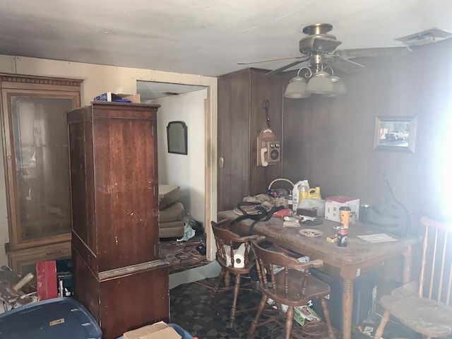 dining room featuring ceiling fan