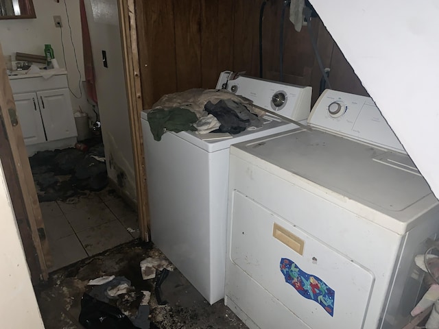 laundry room with separate washer and dryer