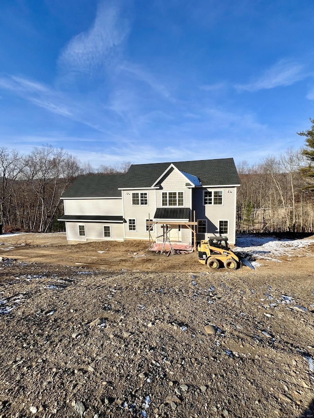 view of front of house featuring a deck