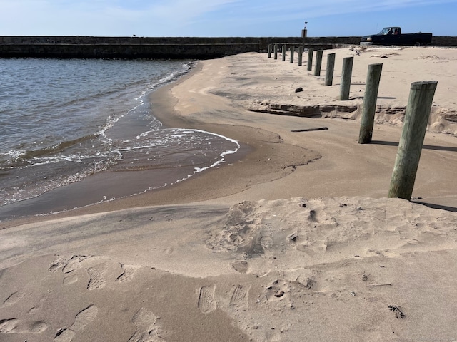 exterior space featuring a beach view