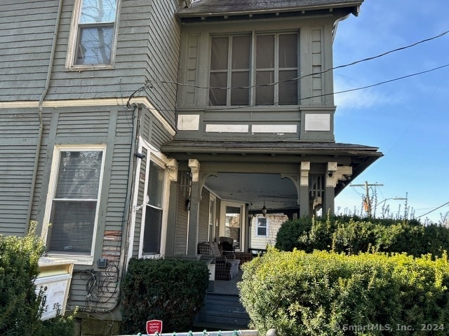 view of front of home featuring covered porch