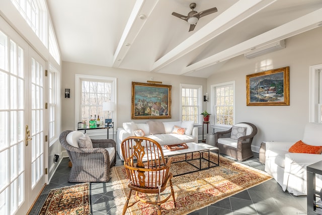 living room with vaulted ceiling with beams, ceiling fan, plenty of natural light, and a wall mounted air conditioner