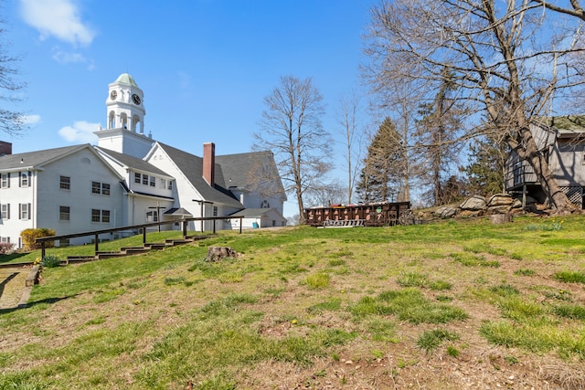 view of yard featuring a wooden deck