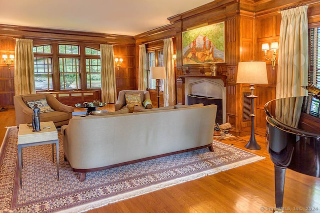 living room featuring ornamental molding and hardwood / wood-style flooring