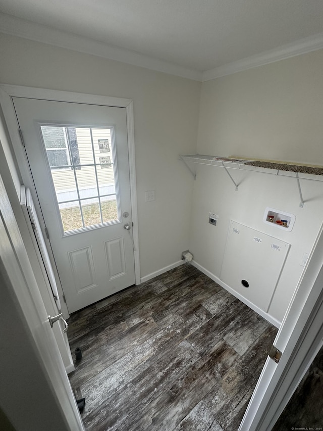 laundry area with hookup for an electric dryer, hookup for a washing machine, ornamental molding, and dark wood-type flooring