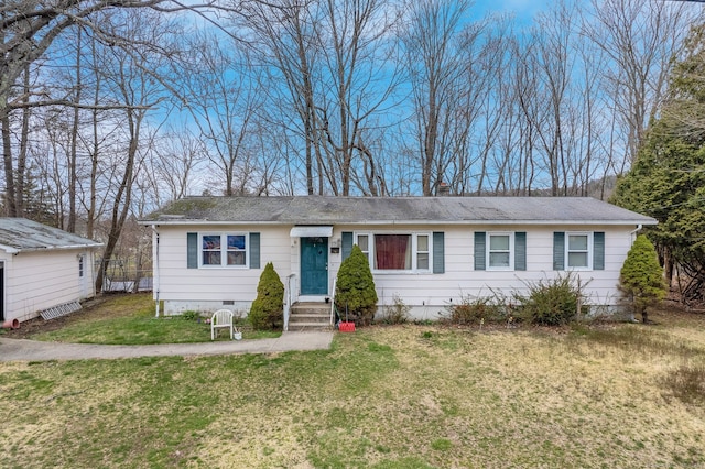 single story home with a front yard