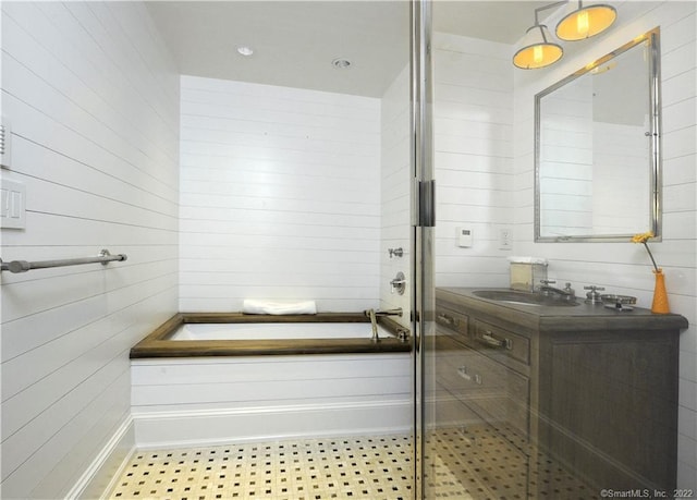 46 Compo Mill Cv, Westport, CT 06880 - full bath featuring a bath, vanity, an enclosed shower, and wood walls