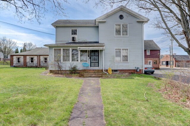 view of front property featuring a front yard