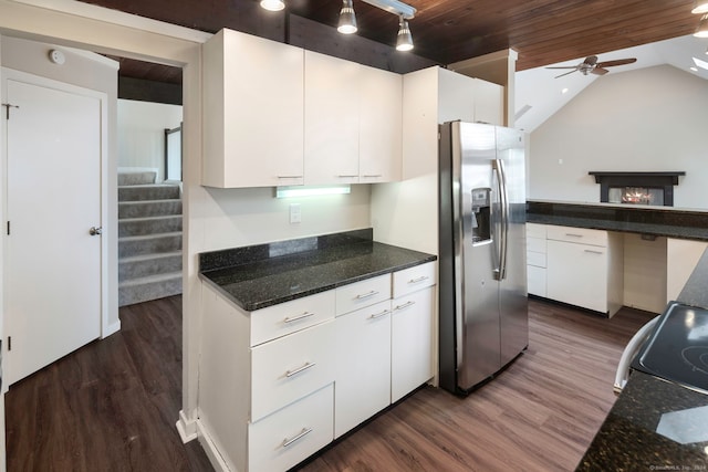 kitchen with white cabinetry, ceiling fan, dark wood-type flooring, stainless steel refrigerator with ice dispenser, and lofted ceiling