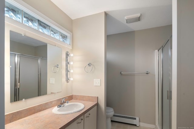 bathroom with vanity, tile patterned flooring, toilet, a baseboard radiator, and a shower with shower door