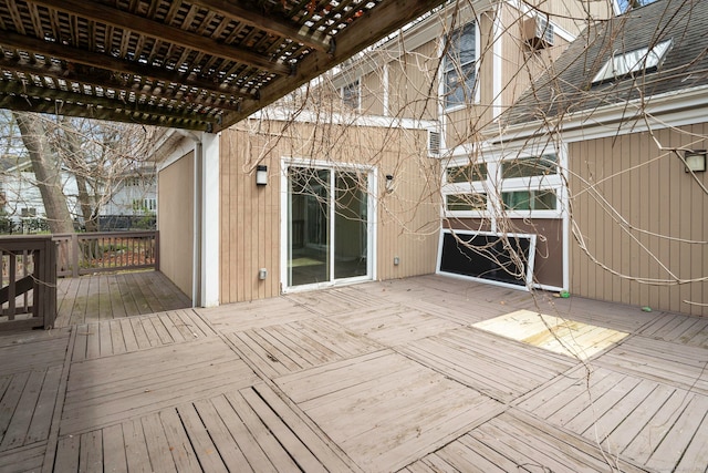 wooden deck featuring a pergola