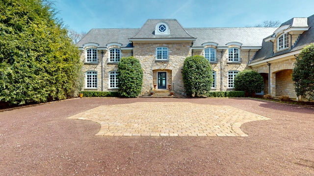 view of french country inspired facade