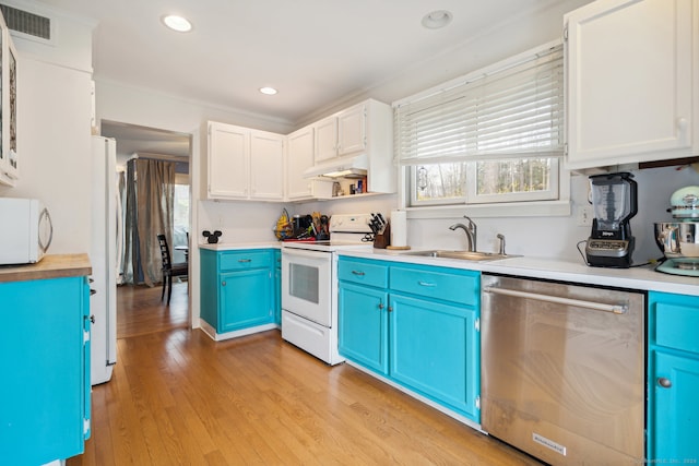 kitchen featuring white appliances, white cabinets, sink, light hardwood / wood-style floors, and blue cabinets