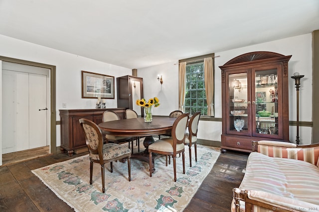 dining room featuring dark hardwood / wood-style flooring