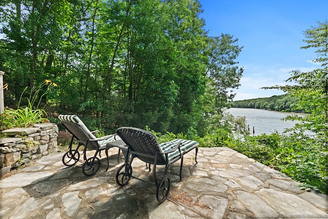 view of patio / terrace with a water view