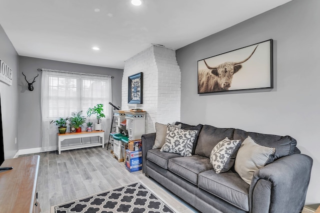 living room with light hardwood / wood-style floors