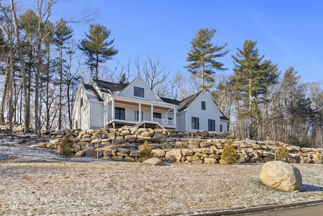 view of front of home featuring covered porch