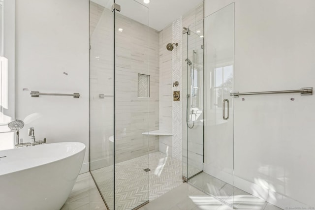 bathroom featuring separate shower and tub and tile patterned flooring