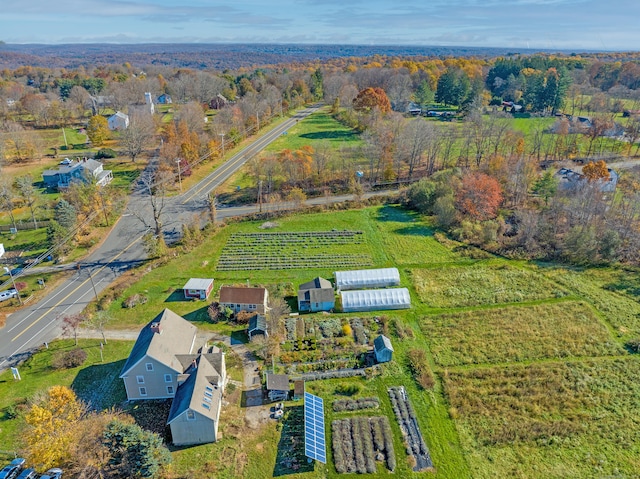 birds eye view of property featuring a rural view