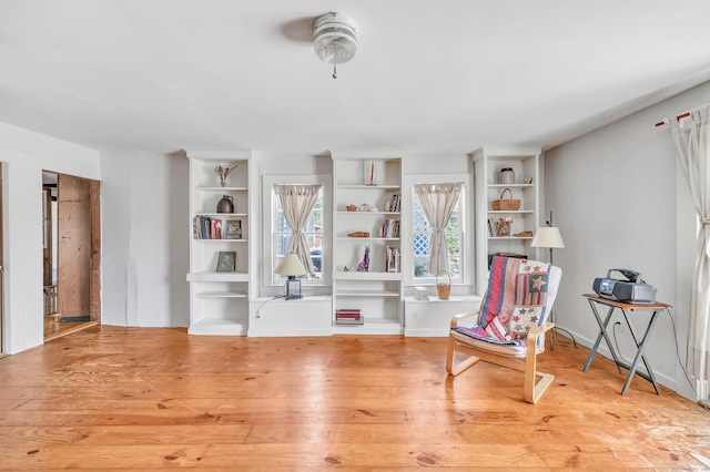 sitting room featuring hardwood / wood-style floors