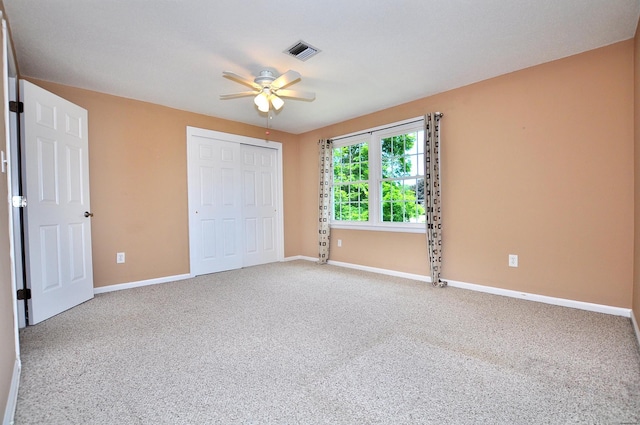 29 Early Dawn Cir Unit 29, Windsor, CT 06095 - unfurnished bedroom with carpet flooring, a closet, and ceiling fan