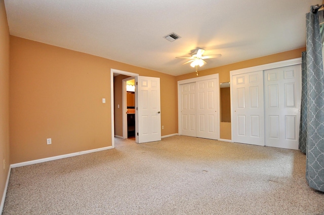 29 Early Dawn Cir Unit 29, Windsor, CT 06095 - unfurnished bedroom featuring multiple closets, carpet flooring, and ceiling fan