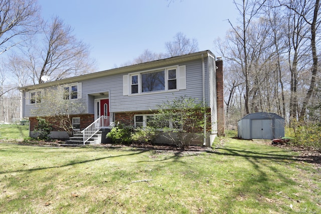 split foyer home with a shed and a front lawn