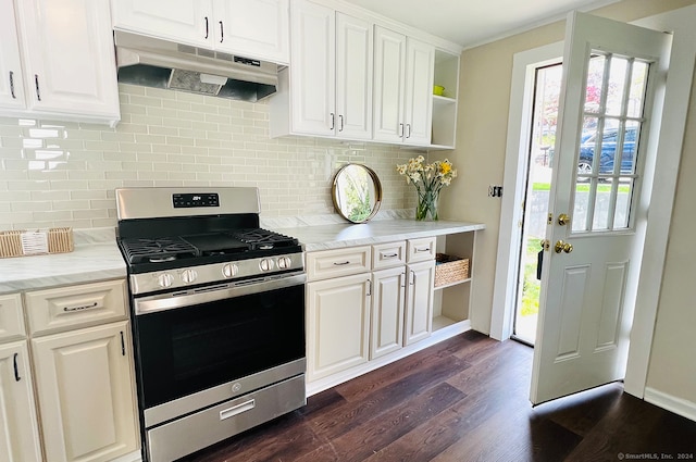 kitchen with white cabinetry, stainless steel stove, light stone countertops, and dark hardwood / wood-style floors