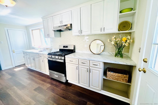 kitchen featuring tasteful backsplash, white cabinetry, stainless steel gas stove, and dark hardwood / wood-style floors