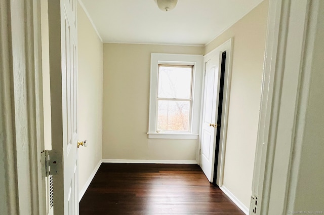 unfurnished bedroom featuring dark wood-type flooring