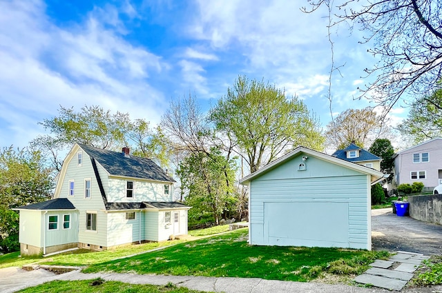 view of home's exterior with a lawn