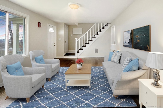 living room with dark hardwood / wood-style flooring