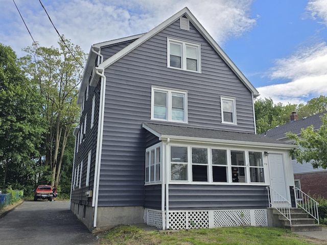 73 Bliss St, East Hartford, CT 06108 - view of front of home with entry steps and asphalt driveway
