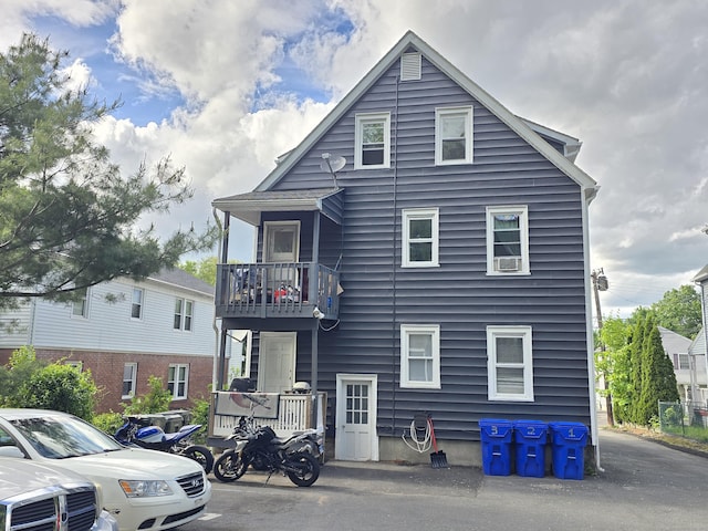 73 Bliss St, East Hartford, CT 06108 - rear view of property with a balcony